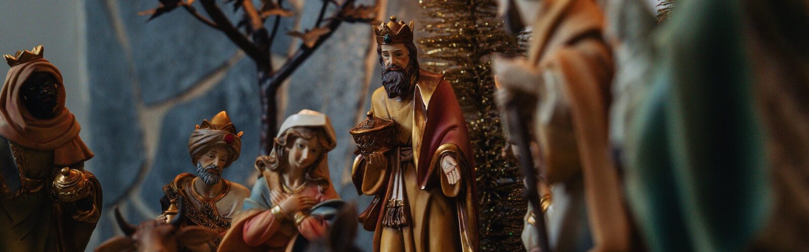 closeup of a nativity scene with tree kings