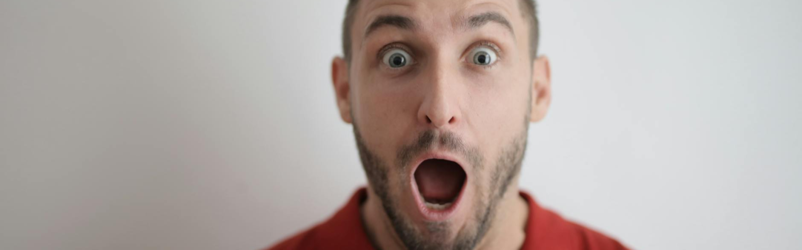 man in red button up shirt