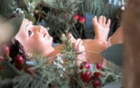 figurine of baby jesus and christmas decoration