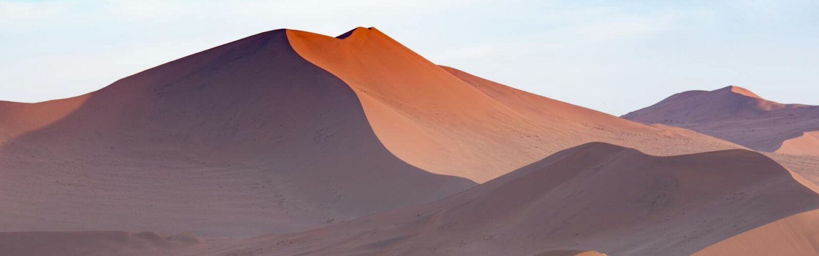 scenic view of desert against sky