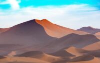 scenic view of desert against sky