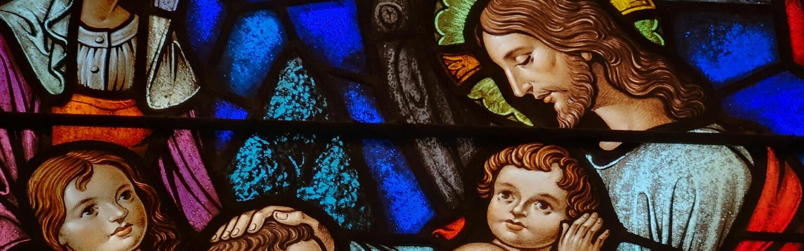 stained glass window with religious theme